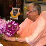 Srila Govinda Maharaj accepts a flower offering